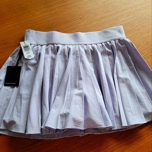 Womens lavender colored TNA/Aritzia pleated tennis skort
